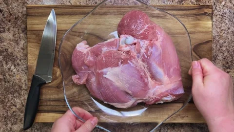 Preparing a turkey thigh for a roulade. Stock Footage 328302789