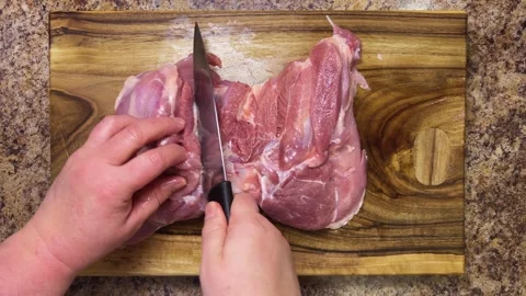 Preparing the turkey thigh for the roulade. Stock-Footage 328303643