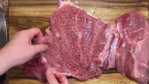 Preparing the turkey thigh for the roulade. Stock Footage 328599385