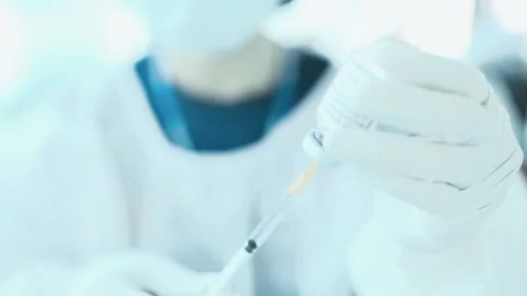 Preparing vaccines for injections to people Stock Footage 156737191