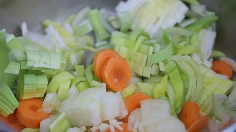Preparing vegetable soup in iron pot Stock Footage 107182525