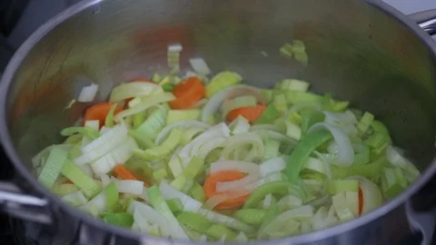 Preparing vegetable soup in iron pot Stock Footage 107182922