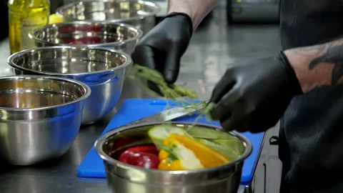 Preparing Vegetables Before Roasting Stock Footage 132165501