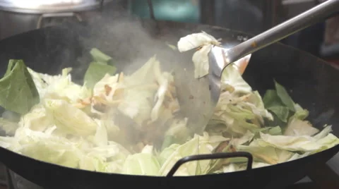 Preparing vegetables with stir fry Video stock 60220361
