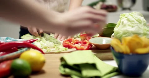 Preparing vegetables for a taco dinner 스톡 동영상 61535026