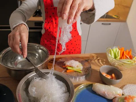 Preparing Vietnamese spring rolls with shrimp and vegetables Stock Photos