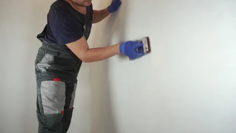 Preparing the wall for painting Stock Footage 267727192