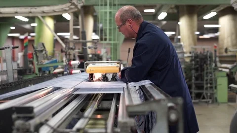 Preparing weaving machine in the textile industry. Stock Footage 72594269