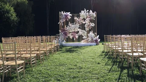Preparing for the wedding, chairs for guests, chairs are in a row Stock Footage 260895086
