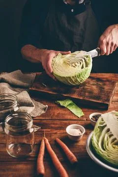 Preparing White Cabbage for Dinner Stock Photos