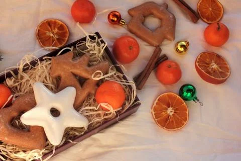 Preparing winter holidays gift box with Christmas gingerbread cookies Stock Photos
