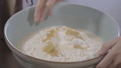 Preparing a yeast dough Stock Footage 95842981
