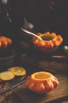 Preparing yellow pattypan squash for stuffing Stock Photos