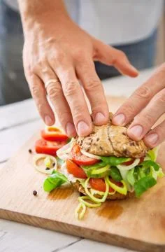 Prepearing sandwich process Stock Photos