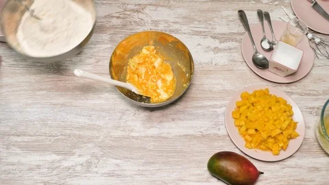 Prepearing of tasty receipt of mango pie with cream Stock Footage 94158953