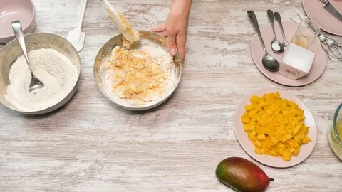 Prepearing of tasty receipt of mango pie with cream Stock Footage 94159100