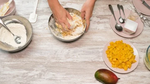 Prepearing of tasty receipt of mango pie with cream Stock Footage 94159206