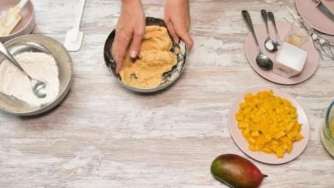 Prepearing of tasty receipt of mango pie with cream Stock Footage 94159275