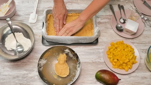 Prepearing of tasty receipt of mango pie with cream Stock Footage 94159401