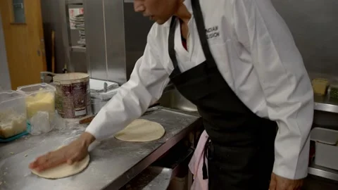 Preperation of naan bread/pastry in indian kitchen Stock Footage 167270165