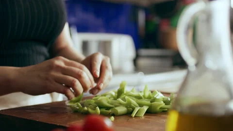 Prepping celery on cutting board ingredients in a large kitchen with an array of Video stock 199461773