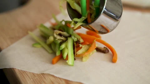 Prepping a spring roll with the filling. 스톡 동영상 232970744