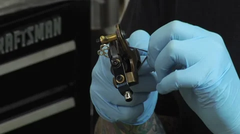 Prepping a tattoo machine Stock Footage 5299303