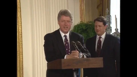 Pres. Clinton talks to distinguished guests present at ceremony - 1994 Vídeos de archivo 90454442