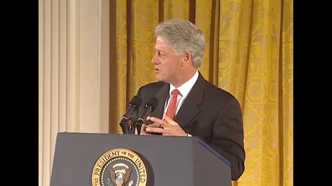 Pres. Clinton talks to the guests present at Hate Crime Legislation - 1997 Stock Footage 90455057