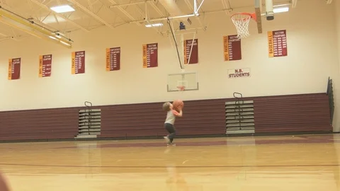 Preschool aged boy attempts to make basketball shot Stock Footage 86528064