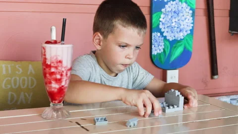 Preschool child building constructor on table. Stock Footage 267859026