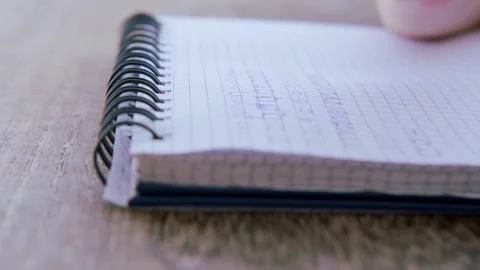 Preschool child draws elements with pen in lined notebook, Writing Before S.. Stock Footage 251760385