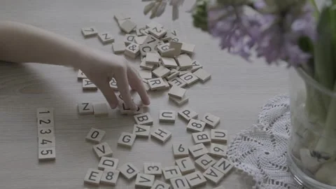 Preschooler learning to count, Child studying numbers on wooden squares, Ma.. Video stock 269156388