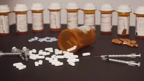 Prescription Medication and Syringes Stock Footage