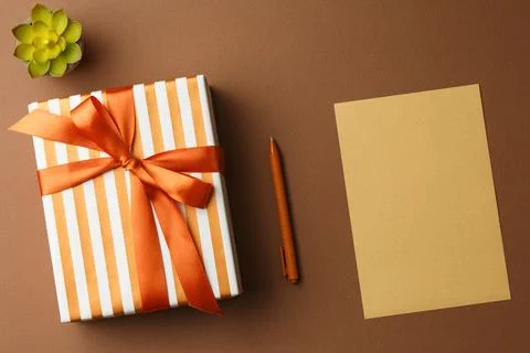 Present box in gift paper. Stock Photos