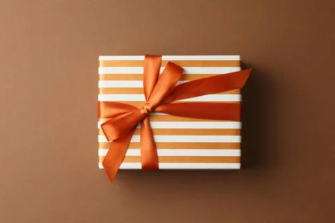 Present box in gift paper. Stock Photos