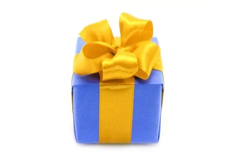 Present box with gold bow Stock Photos