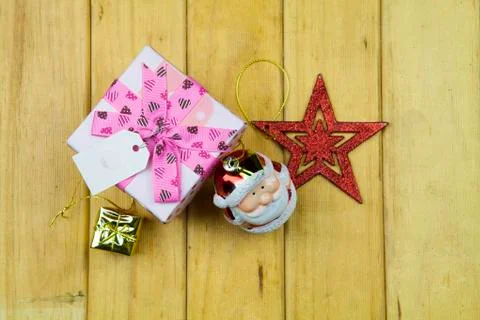 Present box on wooden background Stock Photos