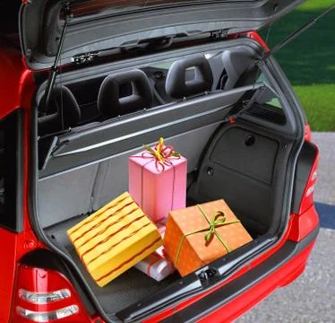 Present boxes in a car Stock Photos