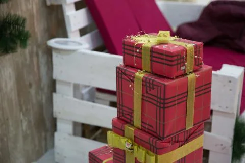 Present boxes at christmas tree. happy new year. celebrate xmas at home. wint Stock Photos