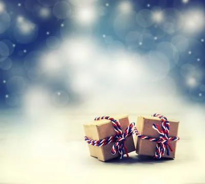 Present boxes tied with tri color twines with illustrated background Stock Photos