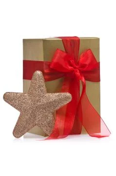 Present decorated with a glitter star Stock Photos