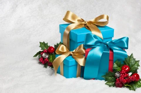 Present in festive decoration Stock Photos