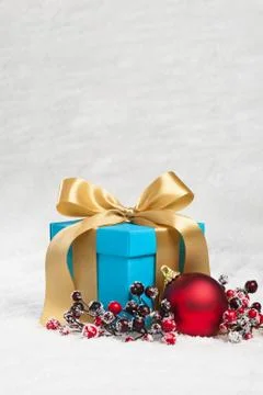 Present in festive decoration Stock Photos