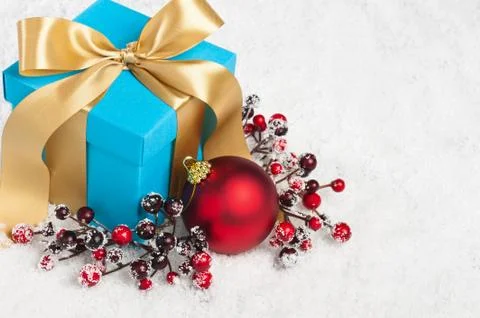 Present in festive decoration Stock Photos