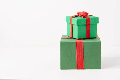 Present. Gift box with a bow. New Year's surprise. Red and green box with a.. Stock Photos
