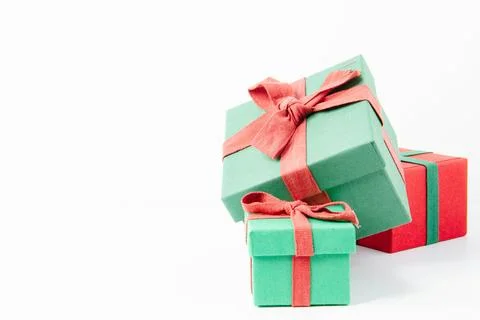 Present. Gift box with a bow. New Year's surprise. Red and green box with a.. Stock Photos