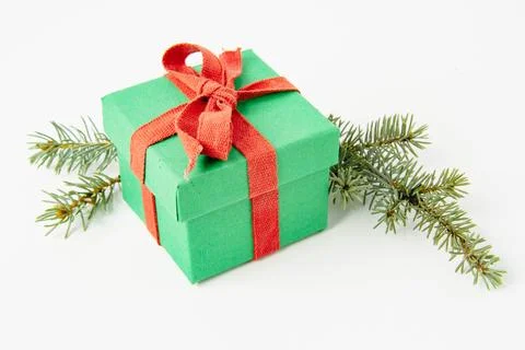 Present. Gift box with a bow. New Year's surprise. Red and green box with a.. Stock Photos