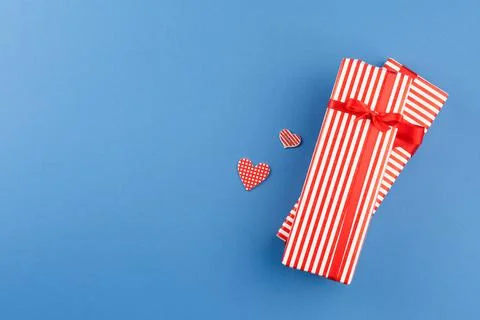 Present in gift paper on the table. Stock-Fotos