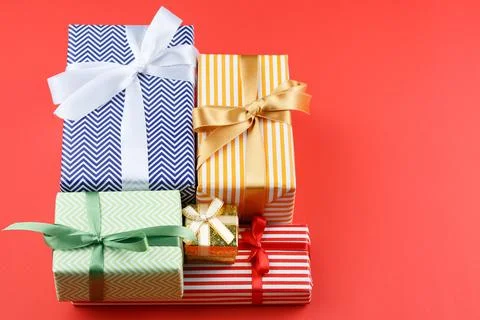 Present in gift paper on the table. Stock Photos